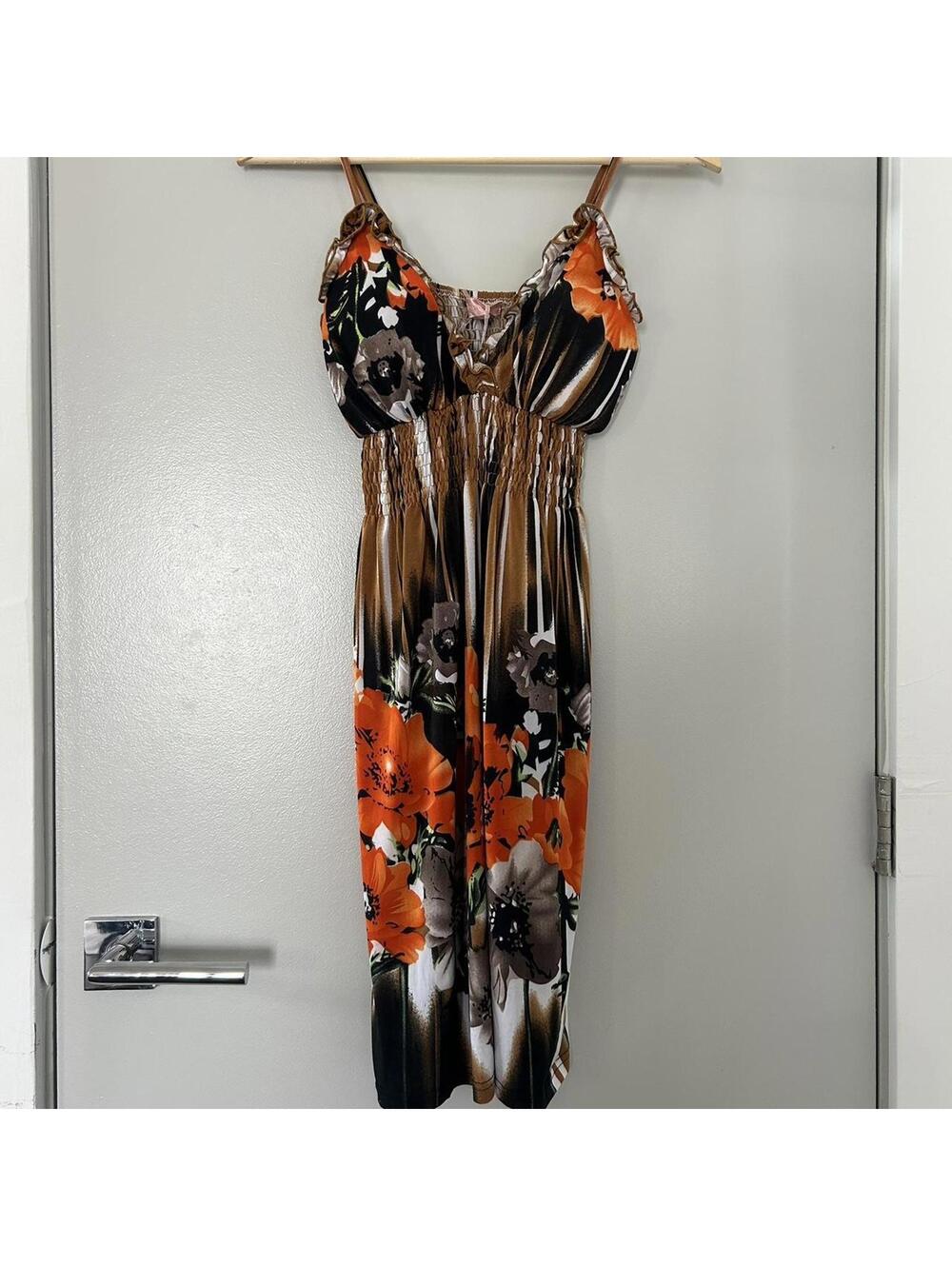 Kassety orange floral dress with adjustable straps and elastic waist